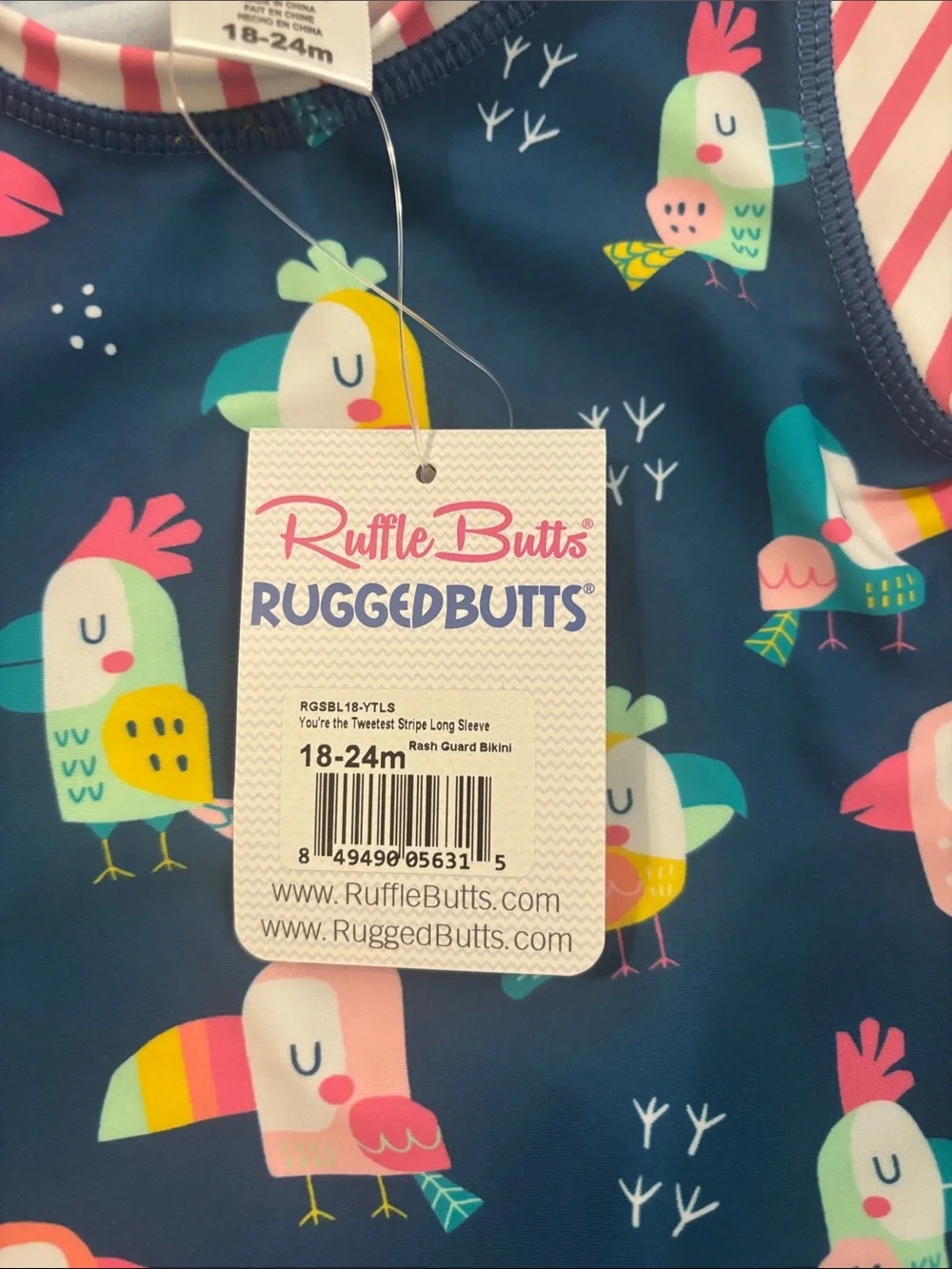 Ruffle Butts Navy Tropical Bird Rashguard Set with Pink Stripes